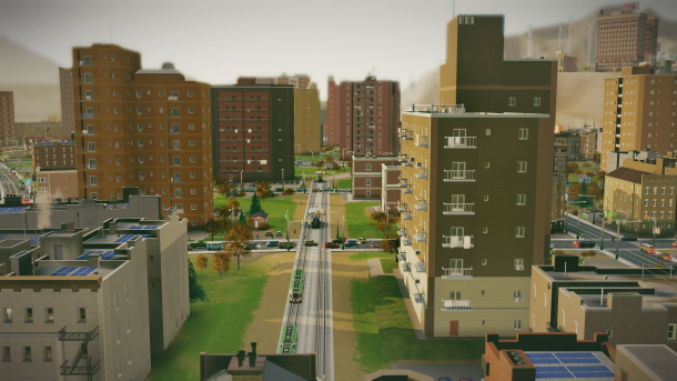 Separated streetcar tracks running through a residential neighborhood.